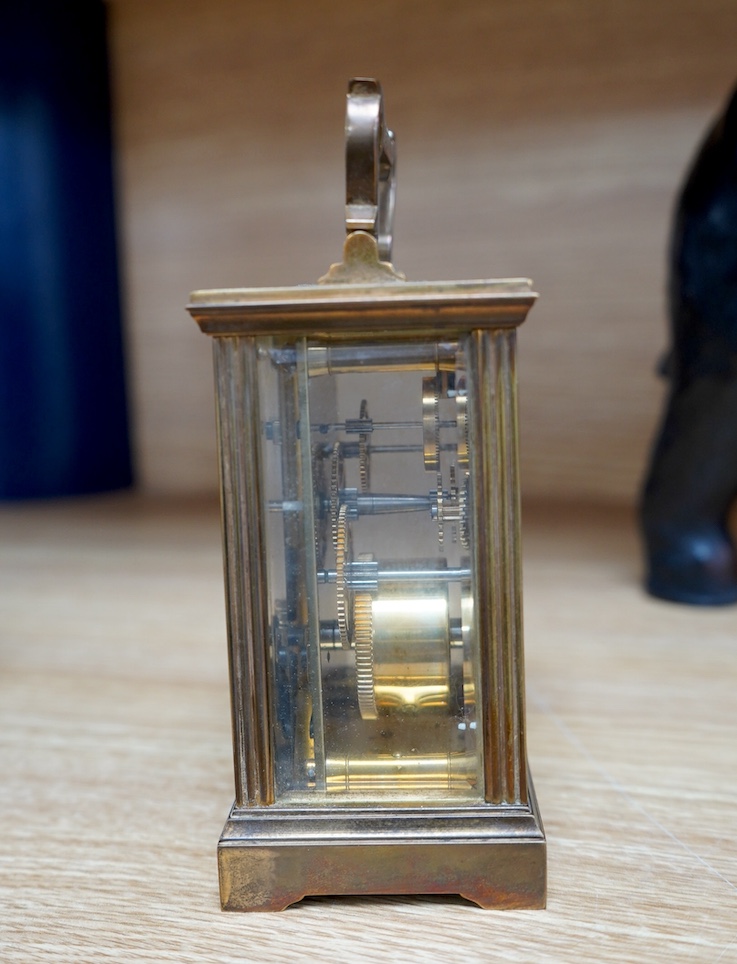 A French eight day carriage timepiece, 11.5cm high. Condition - fair to good.